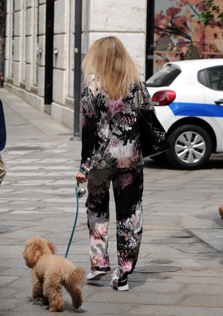 in a White Sneakers Walks Her Little Dog in Milan 05/23/2020