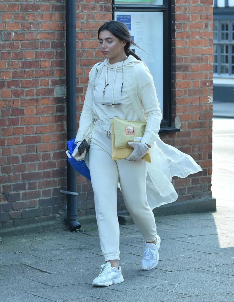 Francesca Allen in a White Jogging Suit