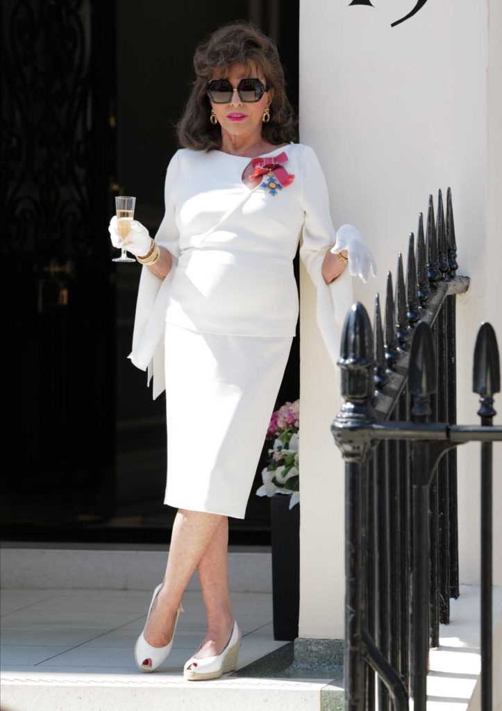 Joan Collins in a White Suit