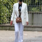 Michelle Hunziker in a White Blazer Goes Shopping at Trussardi Outlet in Bergamo