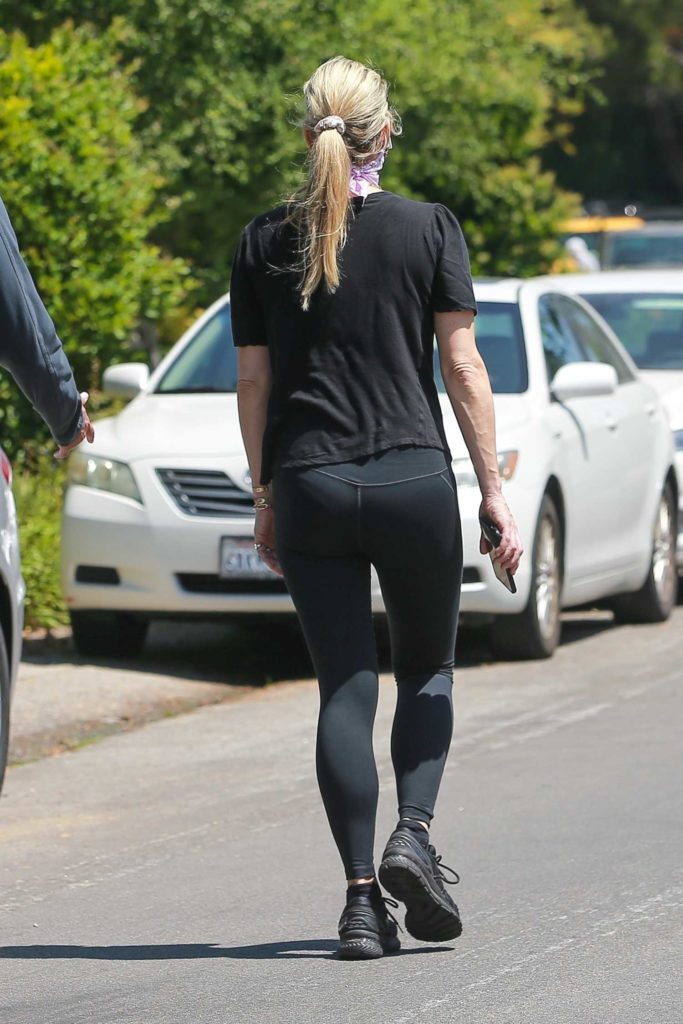 Molly Sims in a Black Tee