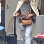 Phoebe Burgess in a Beige Trench Coat Leaves a Photoshoot in Sydney