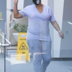 Queen Latifah in a Black Protective Mask Gets Money from the ATM in Beverly Hills