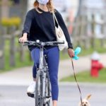 Taylor Neisen in a White Sneakers Does a Bike Ride in New York