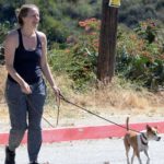Alicia Silverstone in a Black Tank Top Walks Her Dogs while Out for a Hike in Los Angeles