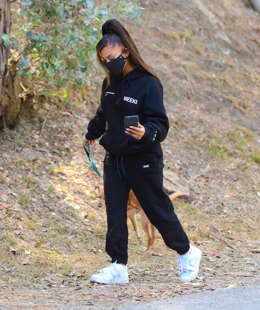 Ariana Grande in a Black Protective Mask