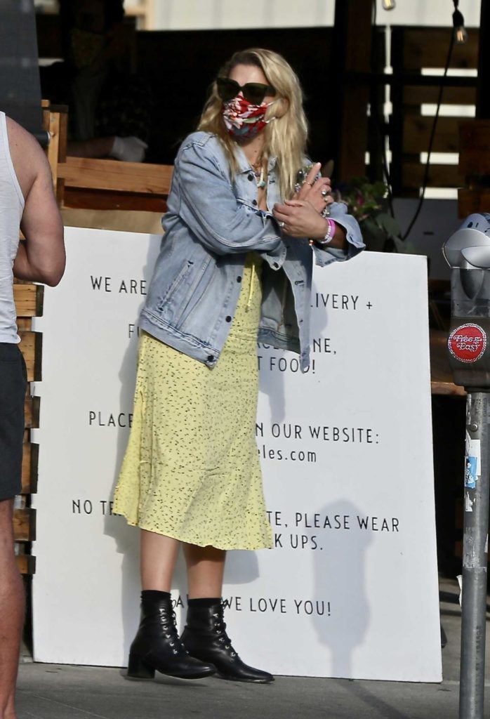 Busy Philipps in a Yellow Dress