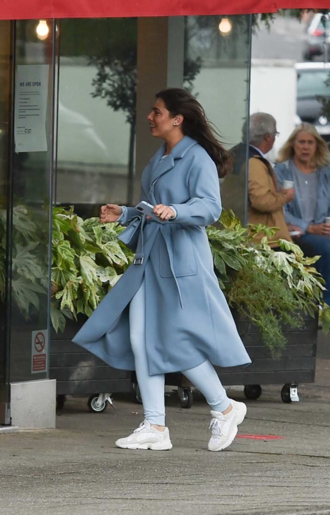 Francesca Allen in a Light Blue Coat