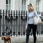 Georgia Toffolo in a Black Leggings Walks Her Dog in London