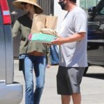 Jackie Sandler in a Straw Hat Picks up Lunch for the Family in Malibu