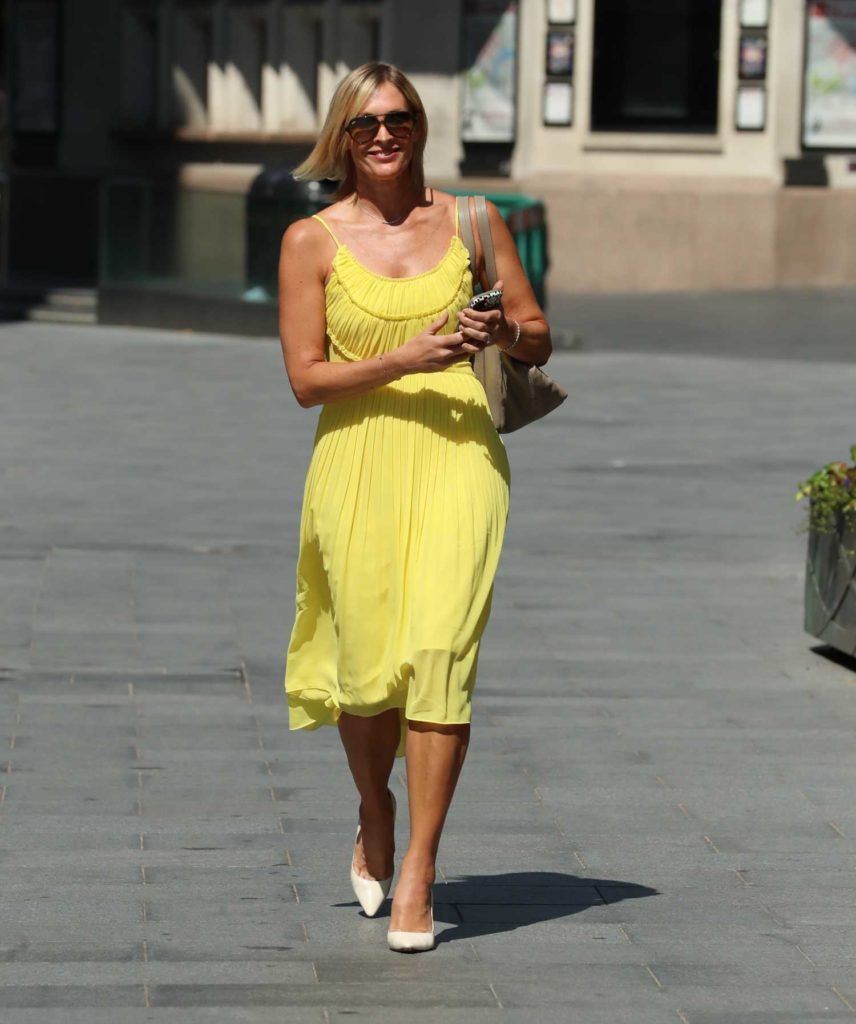 Jenni Falconer in a Yellow Dress