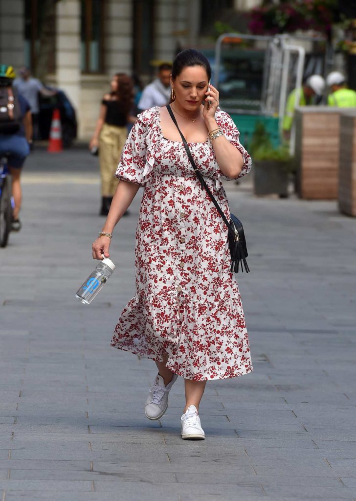 Kelly Brook in a Floral Print Dress