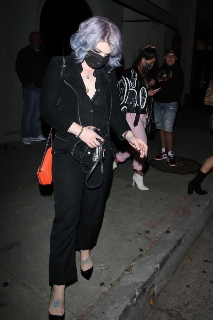 Kelly Osbourne in a Protective Mask