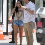 Kristen Doute in a Blue Daisy Duke Shorts Picks Up Takeout Out with Brian Carter in Los Angeles