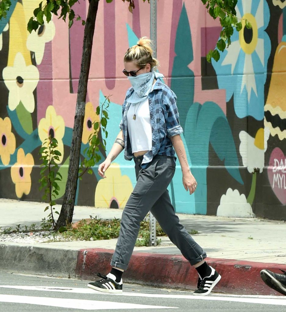 Kristen Stewart in a Black Adidas Sneakers