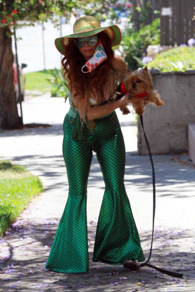 Phoebe Price in a Mermaid Outfit
