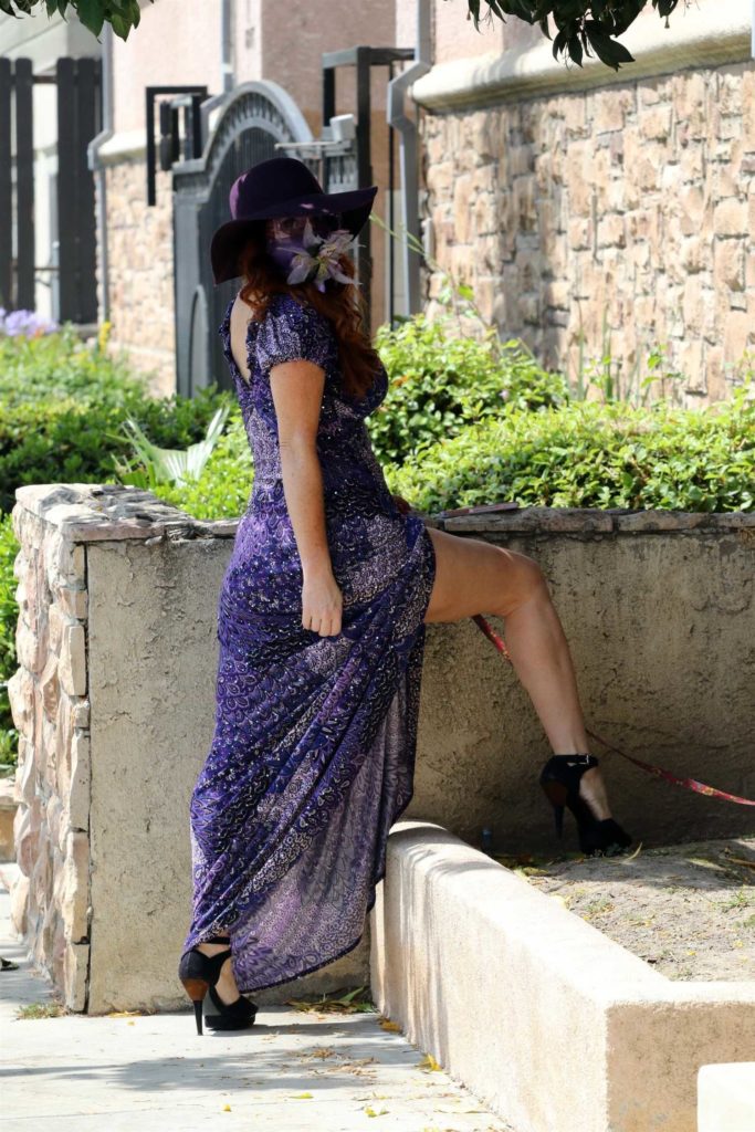 Phoebe Price in a Purple Dress