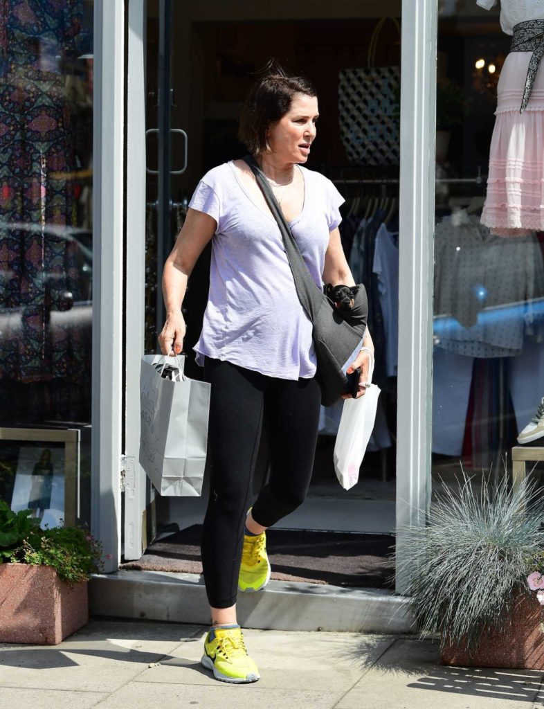 Sadie Frost in a Yellow Nike Sneakers