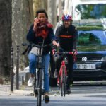 Sophie Marceau in a White Sneakers Does a Bike Ride in Paris