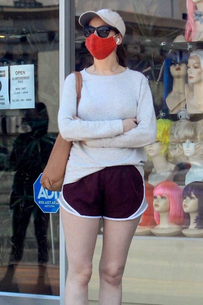 Tamara Duarte in a Red Protective Mask