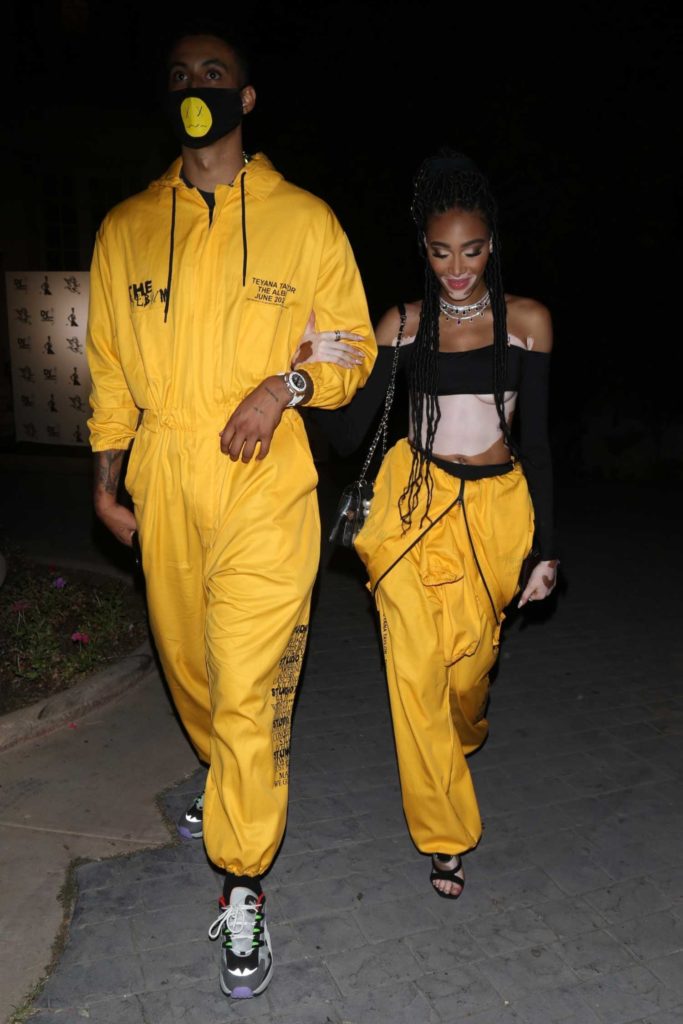 Winnie Harlow in a Yellow Jumpsuit