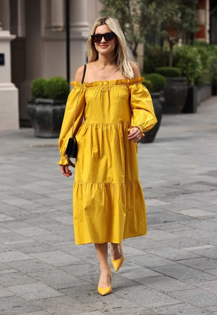 Ashley Roberts in a Yellow River Island Dress