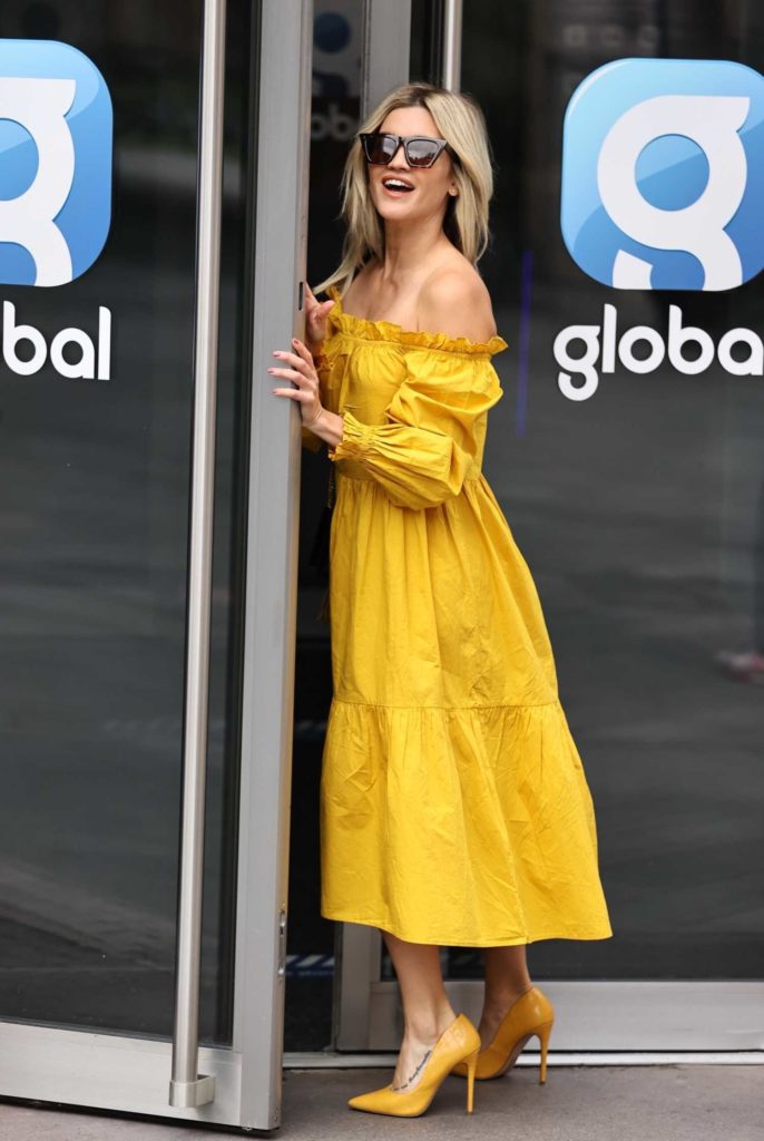 Ashley Roberts in a Yellow River Island Dress