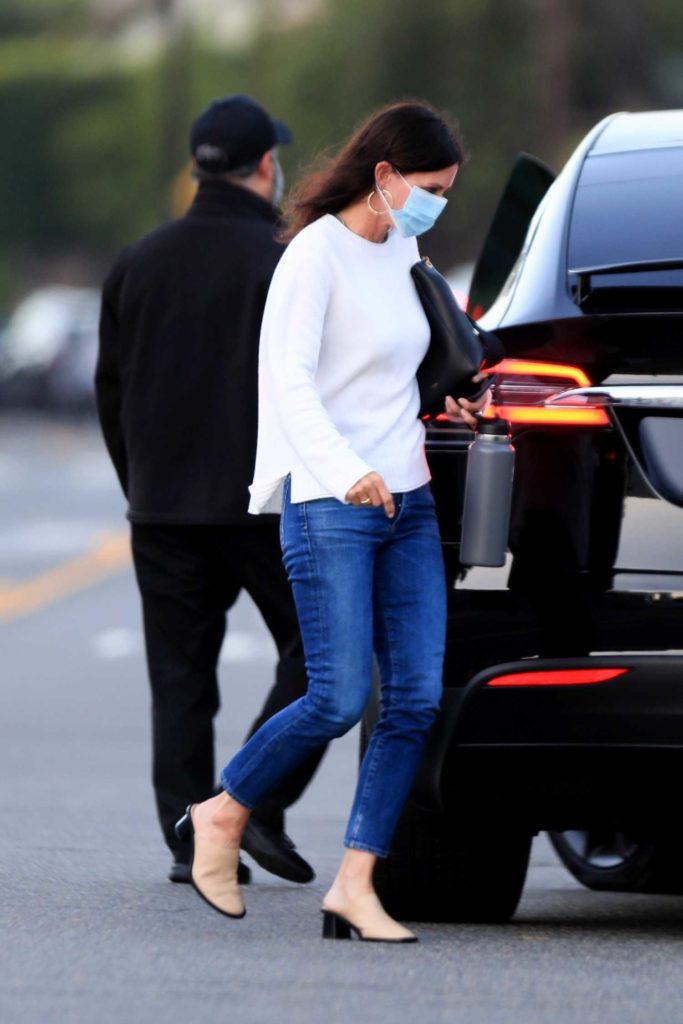 Courteney Cox in a Protective Mask