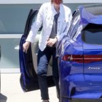 Jane Lynch in a White Jacket Arrives at a Friend’s House in Hollywood