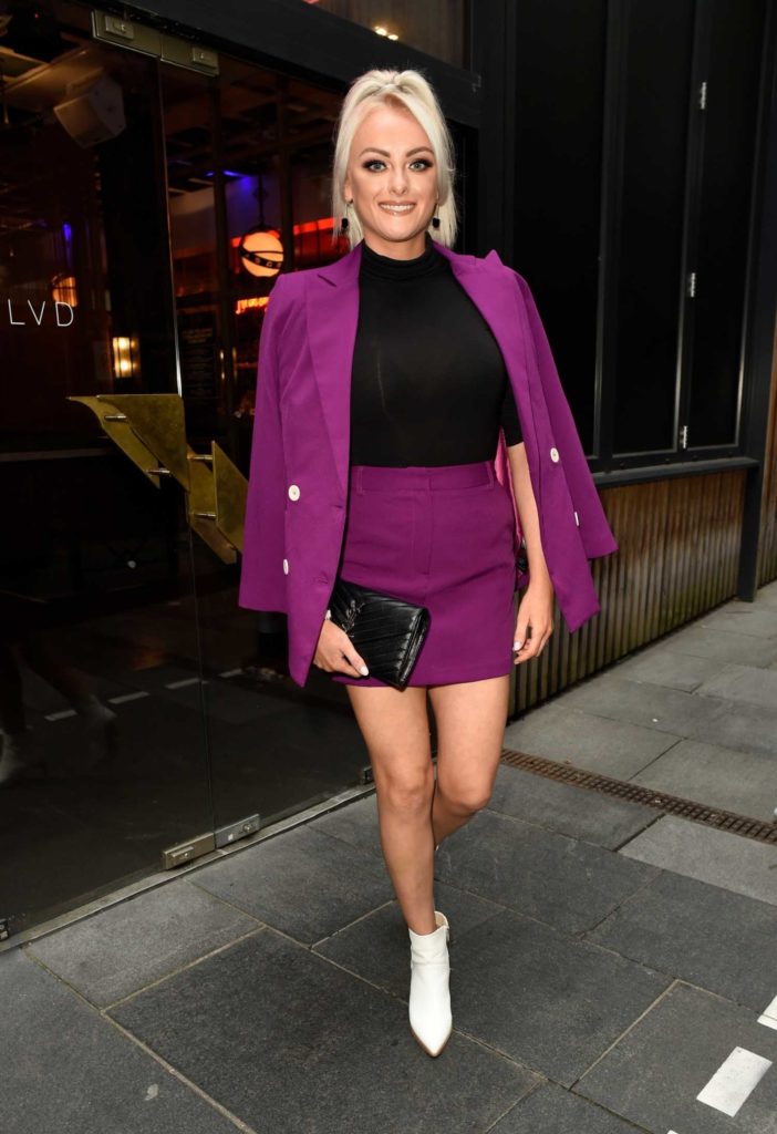 Katie McGlynn in a Purple Suit