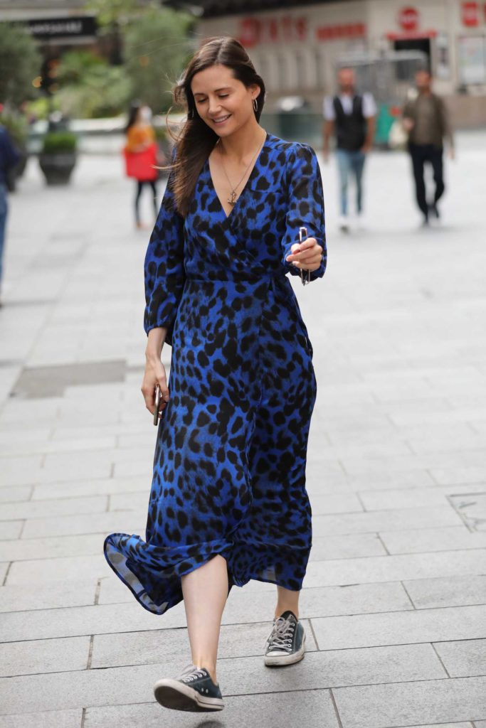 Lilah Parsons in a Blue Animal Print Dress