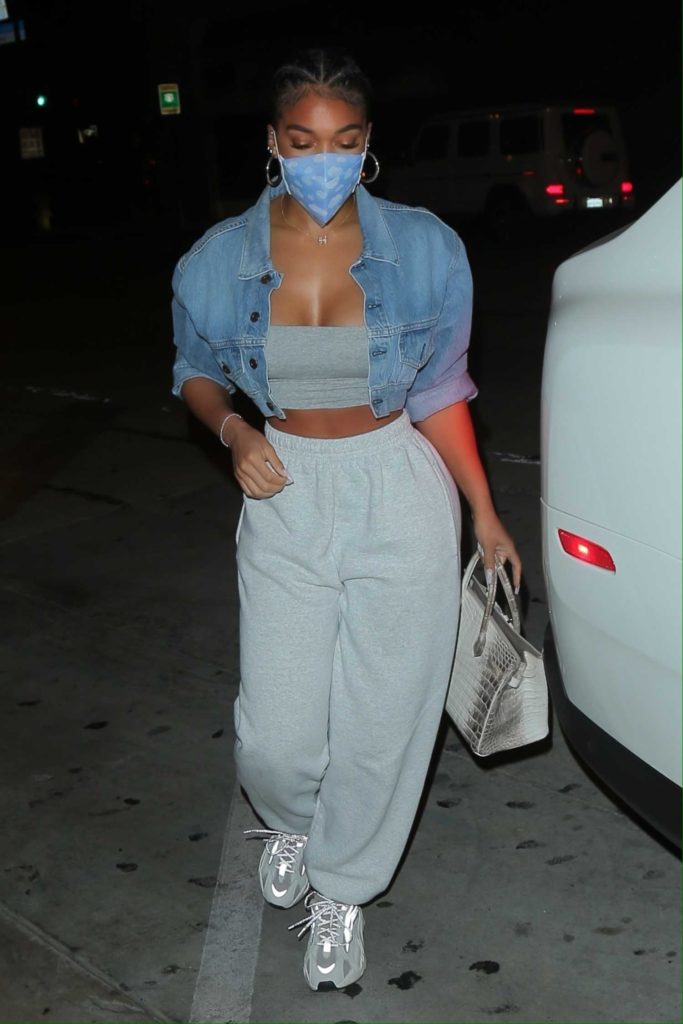 Lori Harvey in a Protective Mask