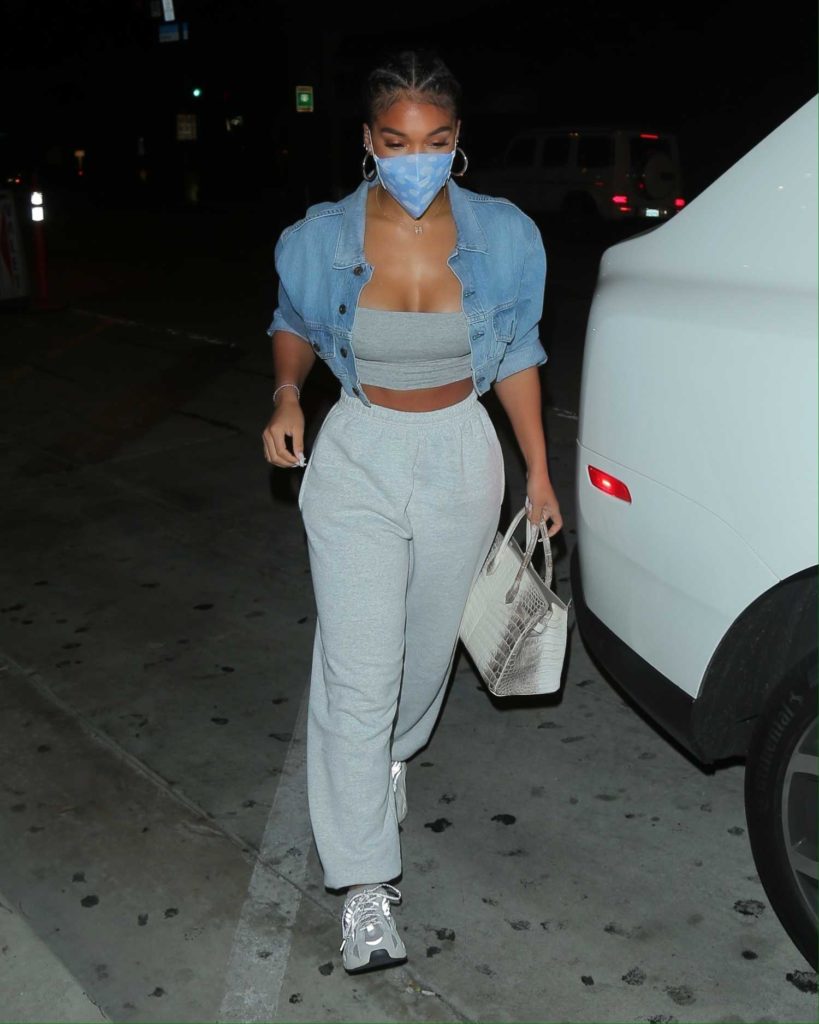 Lori Harvey in a Protective Mask