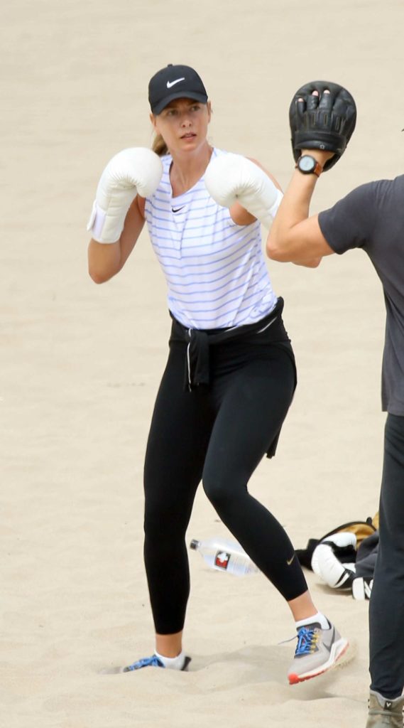 Maria Sharapova in a Black Cap