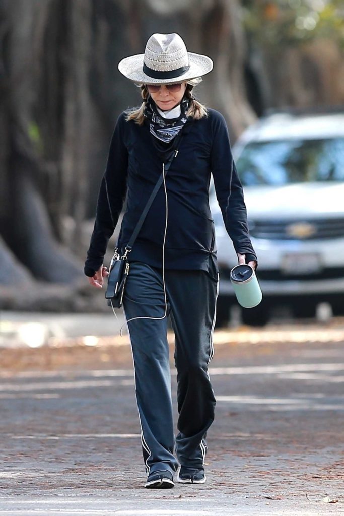Michelle Pfeiffer in a Beige Hat