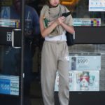 Rainey Qualley in a White Tank Top Stops by Her Local 7-11 Store in Los Angeles