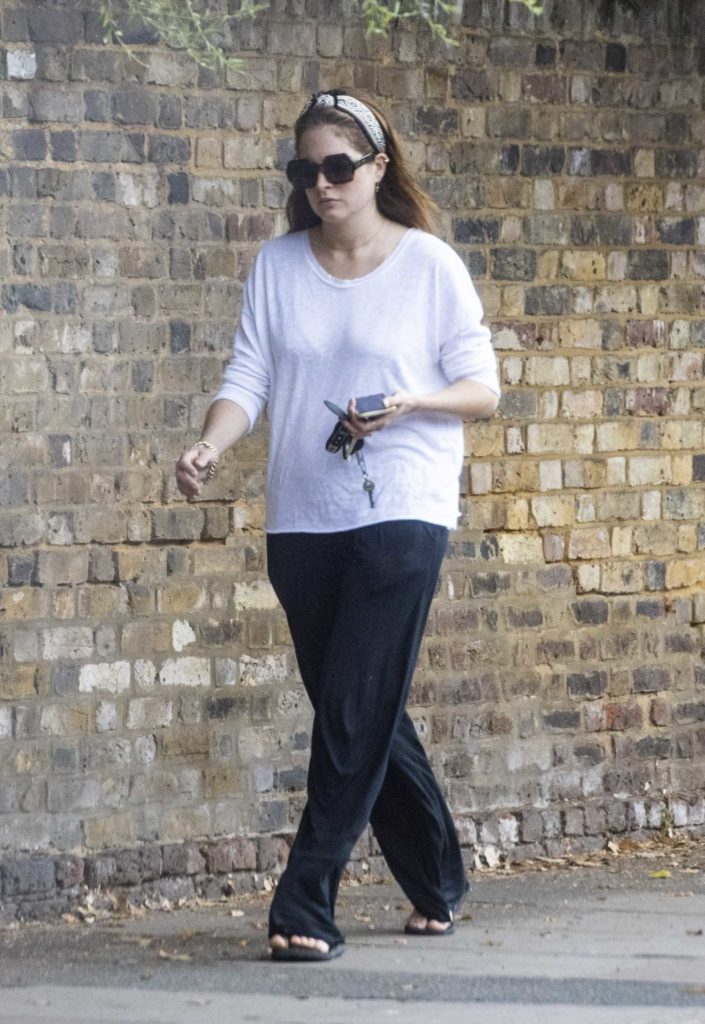 Alexandra Felstead in a White Long Sleeves T-Shirt