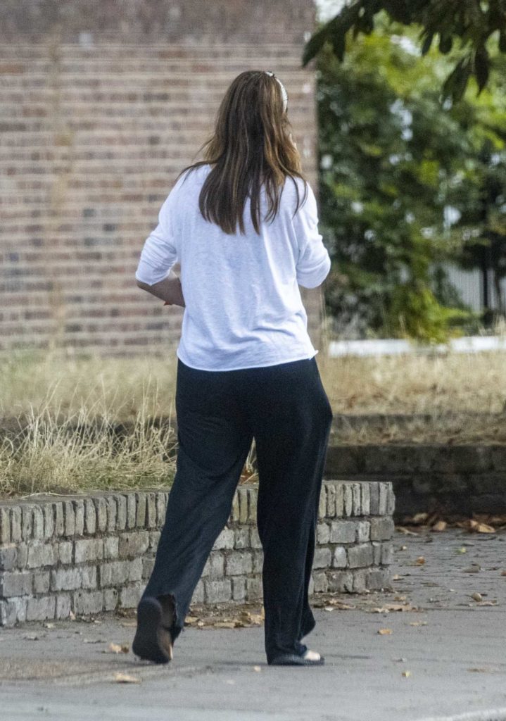 Alexandra Felstead in a White Long Sleeves T-Shirt