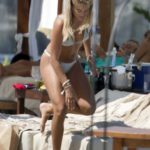 Arabella Chi in a White Bikini on the Beach in Ibiza