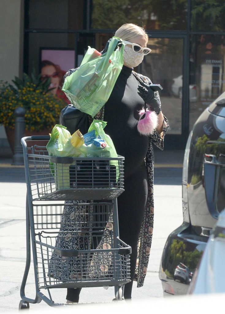 Ashlee Simpson in a Protective Mask