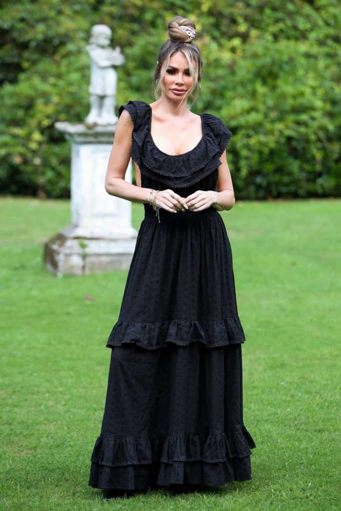 Chloe Sims in a Black Dress