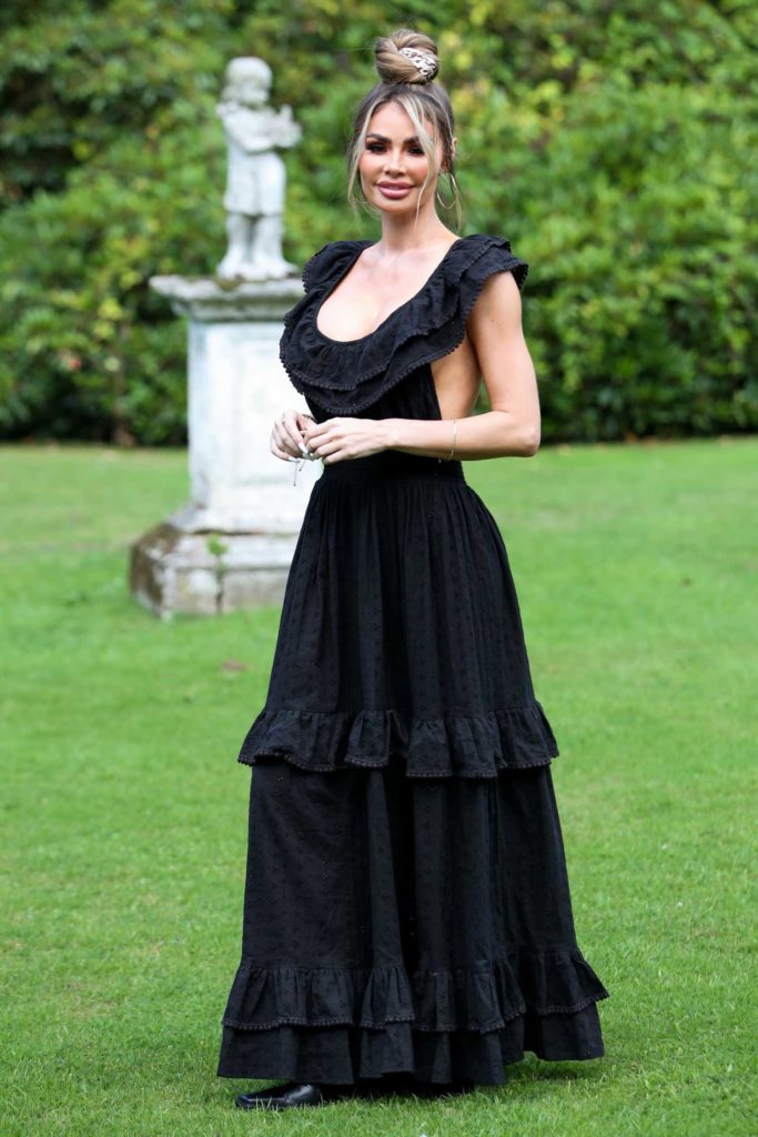 Chloe Sims in a Black Dress