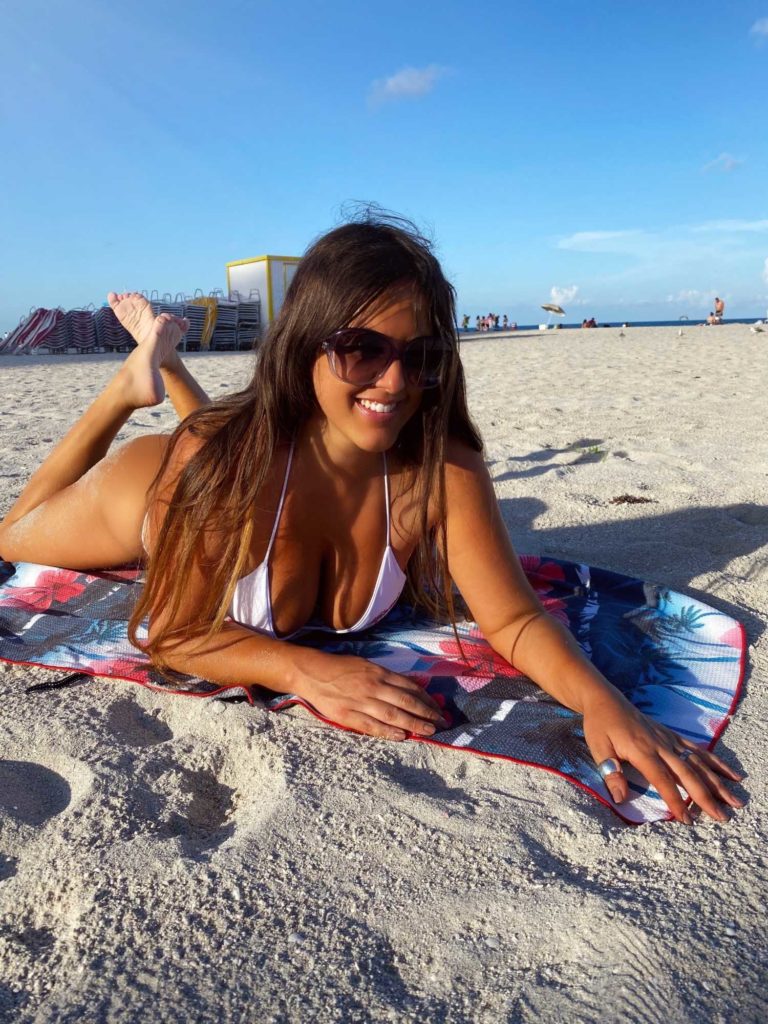 Claudia Romani in a White Bikini