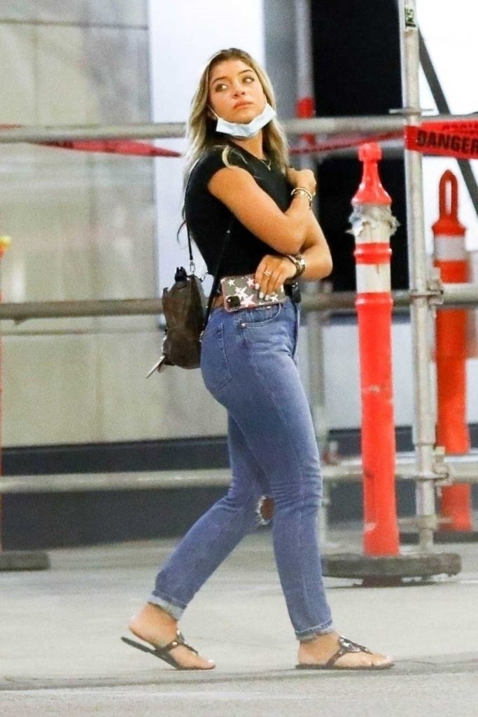 Gia Giudice in a Blue Ripped Jeans