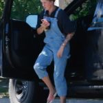 Ireland Baldwin in a Blue Denim Jumpsuit Stops for Iced Coffee in Los Angeles