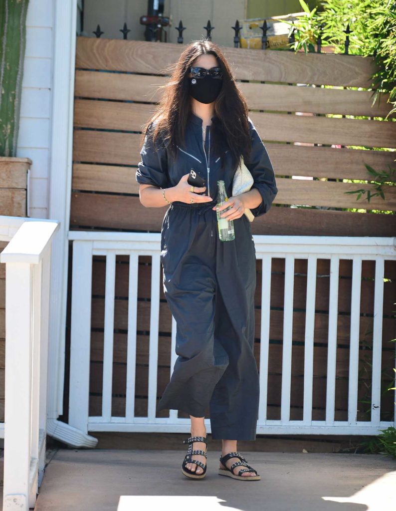 Jessica Gomes in a Black Protective Mask