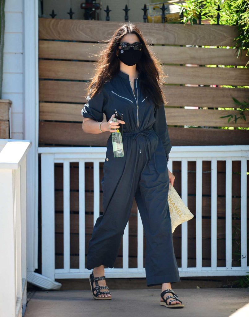 Jessica Gomes in a Black Protective Mask