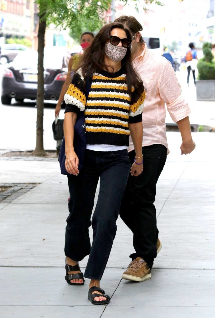 Katie Holmes in a Striped Yellow Knitted Sweater