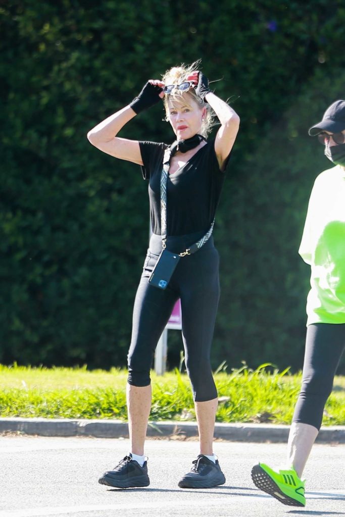 Melanie Griffith in a Black Sneakers