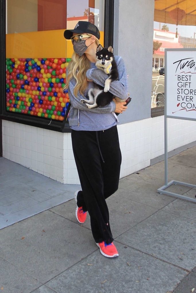 Paris Hilton in a Red Sneakers